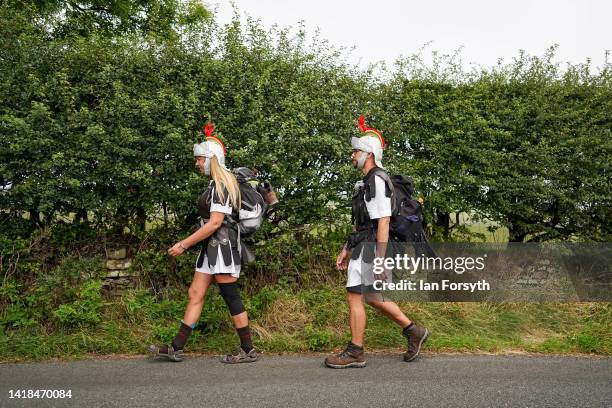 Couple dress as Roman soldiers as they walk the length of Hadrian's Wall in two days to raise money for the Me and Dee charity on August 27, 2022 in...