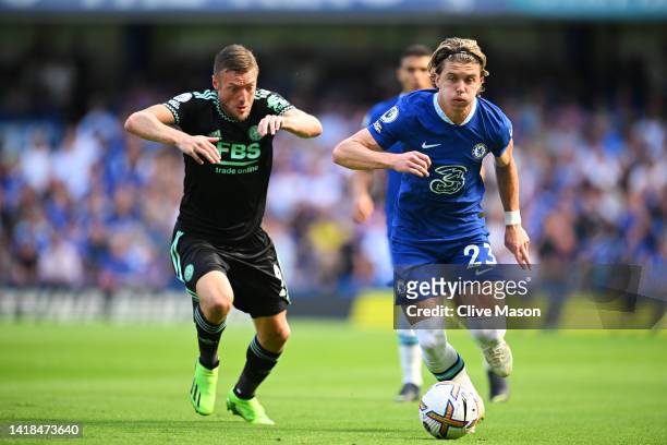 Conor Gallagher of Chelsea battles for possession with Jamie Vardy of Leicester City during the Premier League match between Chelsea FC and Leicester...