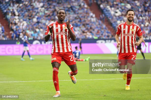 Sheraldo Becker of FC Union Berlin celebrates after scoring their team's fourth goal during the Bundesliga match between FC Schalke 04 and 1. FC...