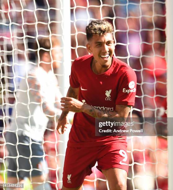 Roberto Firmino of Liverpool celebrates after scoring the fourth goal during the Premier League match between Liverpool FC and AFC Bournemouth at...