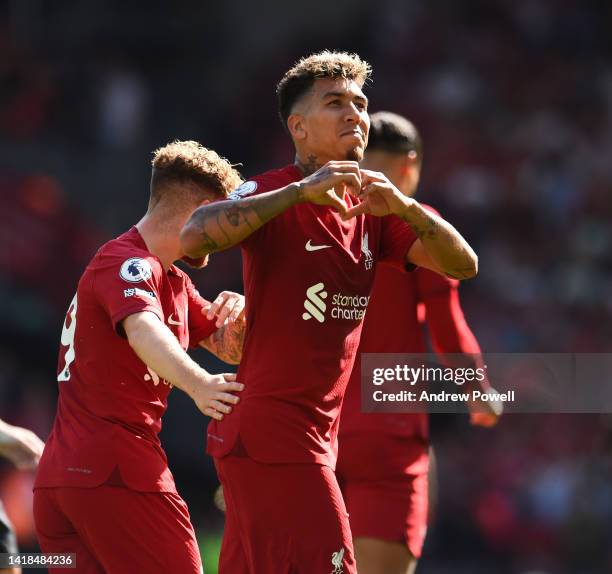 Roberto Firmino of Liverpool celebrates after scoring the fourth goal during the Premier League match between Liverpool FC and AFC Bournemouth at...