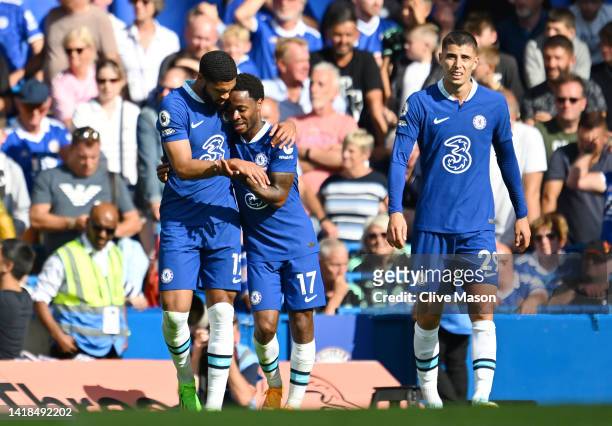 Raheem Sterling of Chelsea celebrates with teammate Ruben Loftus-Cheek after scoring their team's second goal during the Premier League match between...