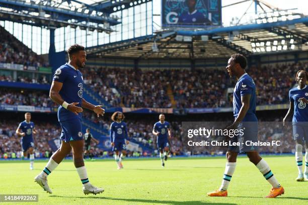 Raheem Sterling of Chelsea celebrates with teammate Reece James after scoring their team's second goal during the Premier League match between...