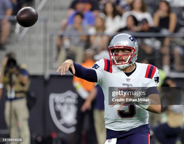 Quarterback Brian Hoyer of the New England Patriots throws against the Las Vegas Raiders during their preseason game at Allegiant Stadium on August...