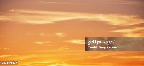 wispy clouds in the sky - sunset stock pictures, royalty-free photos & images