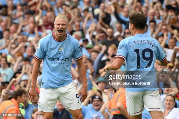 Erling Haaland of Manchester City celebrates their sides fourth goal and their hat trick during the Premier League match between Manchester City and...