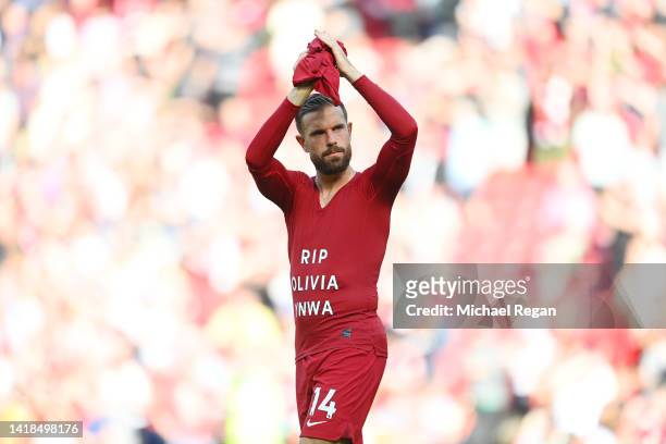 Jordan Henderson of Liverpool applauds the fans following their side's victory in the Premier League match between Liverpool FC and AFC Bournemouth...