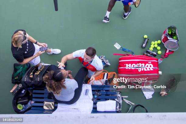August 27. Serena Williams of the United States prepares for a practice session with her team and her dog in preparation for the US Open Tennis...
