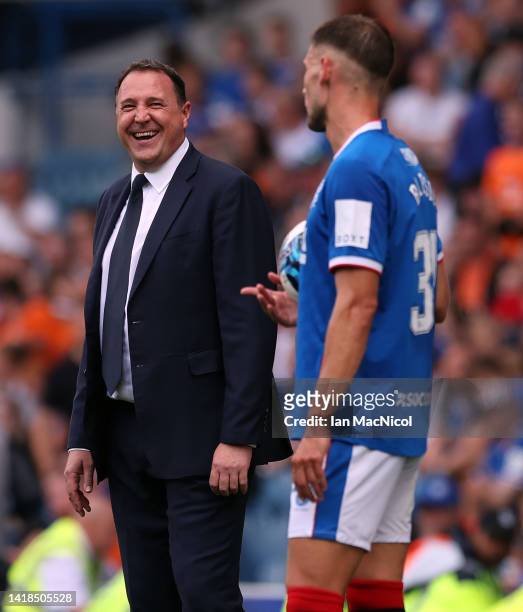 Ross County manager Malky MacKay interacts with Borna Barisic of Rangers during the Cinch Scottish Premiership match between Rangers FC and Ross...