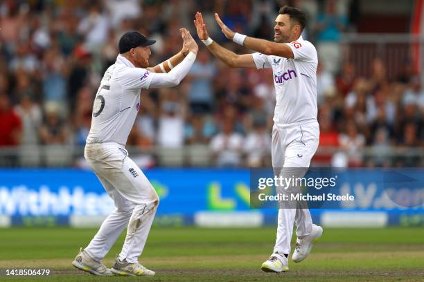 James Anderson of England celebrates with Ben Stokes after taking the wicket of Kagiso Rabada of South Africa during day three of the LV= Insurance...