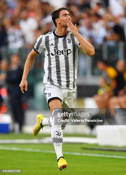 Dusan Vlahovic of Juventus celebrates after scoring their team's first goal during the Serie A match between Juventus and AS Roma at Allianz Stadium...