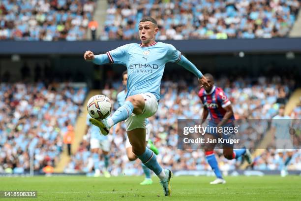 Phil Foden of Manchester City in action during the Premier League match between Manchester City and Crystal Palace at Etihad Stadium on August 27,...