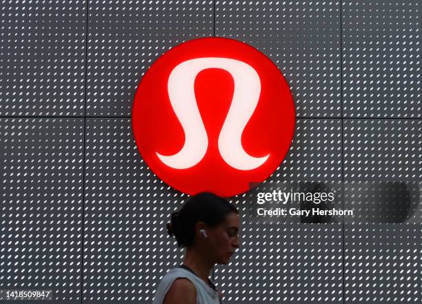 The corporate logo for Lululemon hangs on a wall at their store in Brookfield Place on August 26 in New York City.