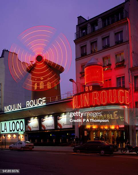 moulin rouge at night, pigalle, paris, france - the place pigalle in paris stock pictures, royalty-free photos & images
