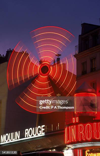 neon signs for the moulin rouge at dusk, pigalle, paris, france - the place pigalle in paris stock pictures, royalty-free photos & images