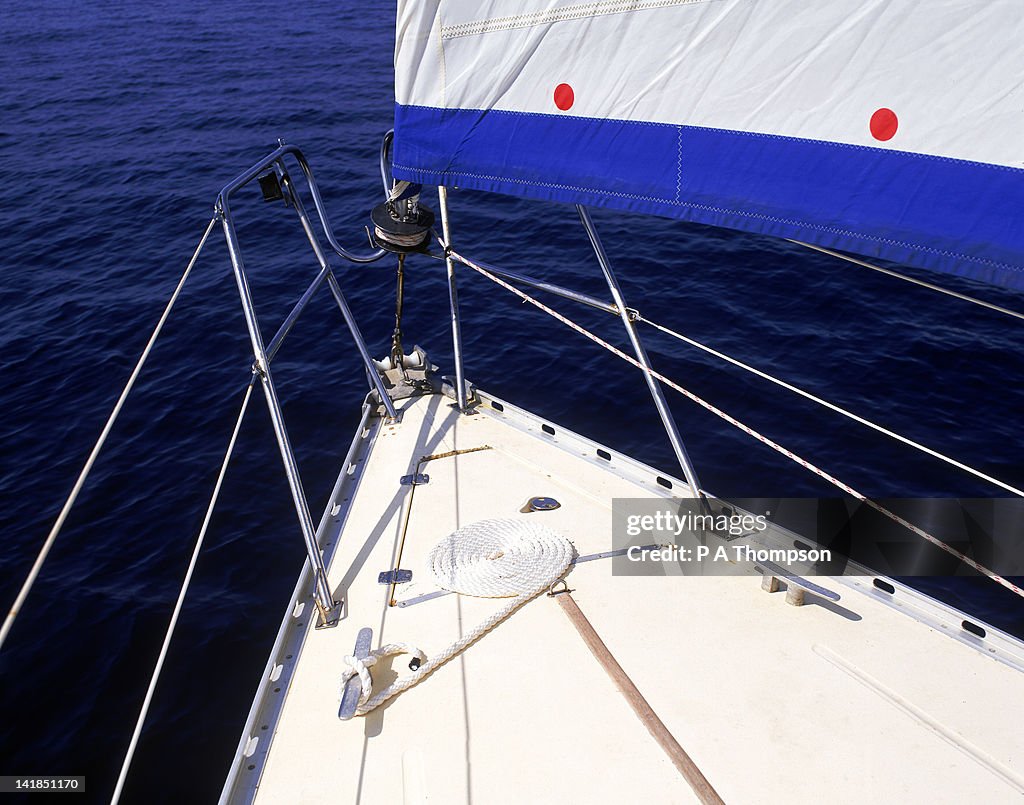 Bow of yacht under sail