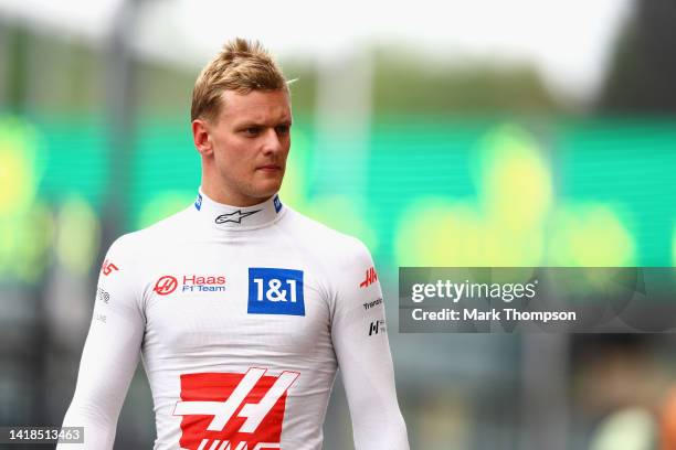 15th place qualifier Mick Schumacher of Germany and Haas F1 walks in the Pitlane during qualifying ahead of the F1 Grand Prix of Belgium at Circuit...