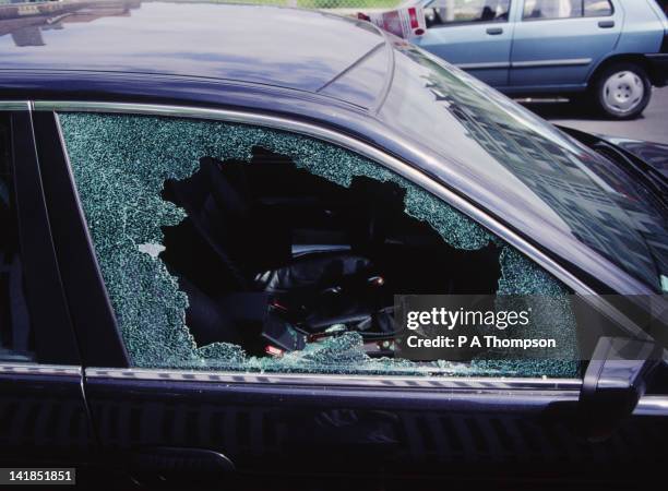 smashed car window, france - stealing crime ストックフォトと画像