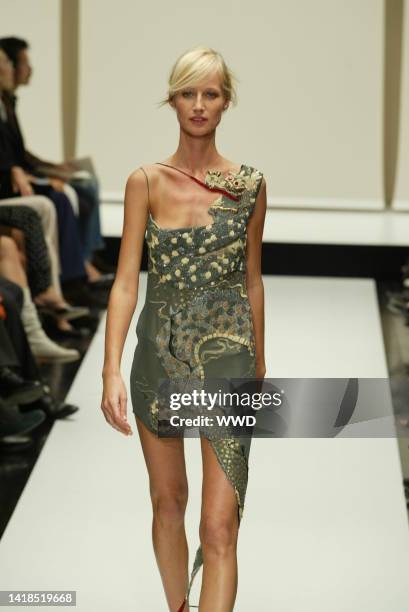 Model walks down the runway at the Spring 2003 Krizia show in Milan.