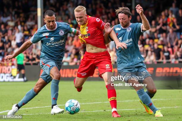 Isac Lidberg of Go Ahead Eagles battles for the ball with Adil Auassar of Sparta Rotterdam and Bart Vriends of Sparta Rotterdam during the Dutch...