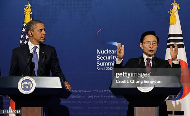 President Barack Obama and South Korean President Lee Myung-Bak attend during a joint press conference at the presidential house on March 25, 2012 in...