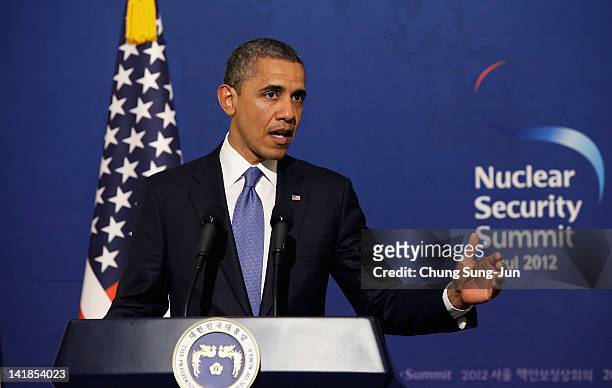 President Barack Obama speaks as he attends a joint press conference with South Korean President Lee Myung-Bak at the presidential house on March 25,...