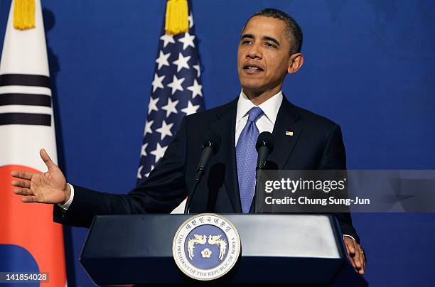 President Barack Obama speaks as he attends a joint press conference with South Korean President Lee Myung-Bak at the presidential house on March 25,...