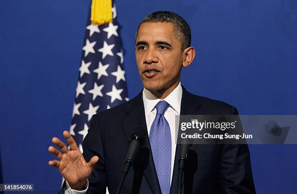 President Barack Obama speaks as he attends a joint press conference with South Korean President Lee Myung-Bak at the presidential house on March 25,...