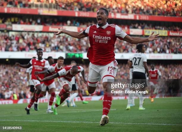 William Saliba of Arsenal celebrates the goal of Gabriel Magalhaes of Arsenal during their sides second goal with team mates during the Premier...