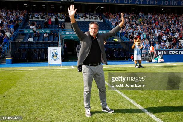 David Wagner the former Head Coach of Huddersfield Town greets the home fans as he returns to the club for the first time in three years during the...