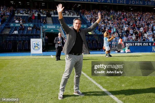 David Wagner the former Head Coach of Huddersfield Town greets the home fans as he returns to the club for the first time in three years during the...