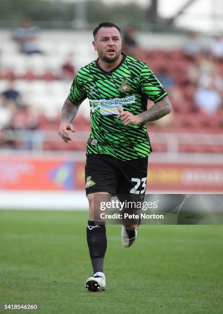 Lee Tomlin of Doncaster Rovers in action during the Sky Bet League Two between Northampton Town and Doncaster Rovers at Sixfields on August 27, 2022...