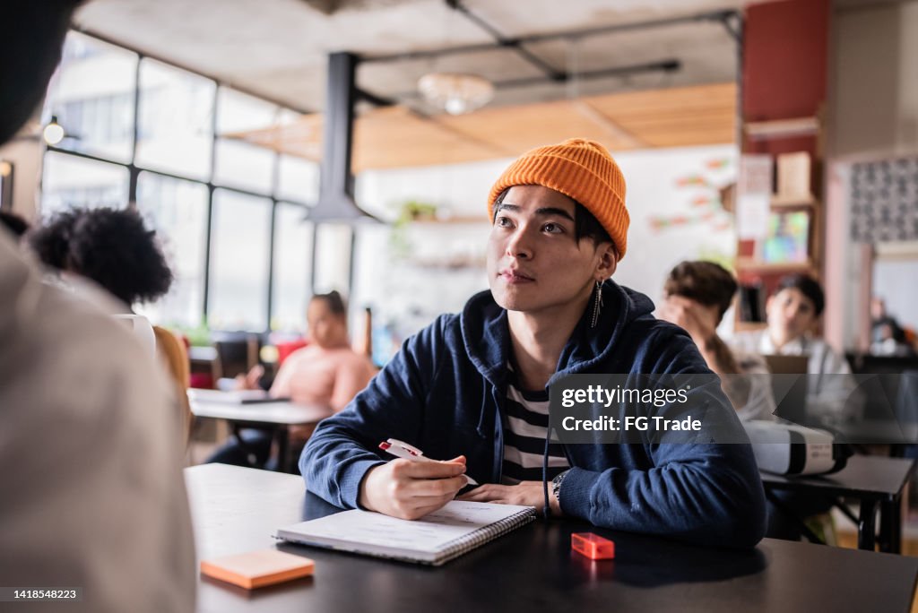 Young man during class in the university