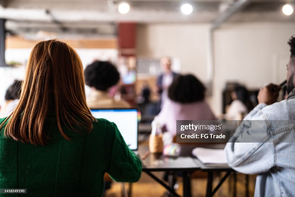 Young woman during class in the university
