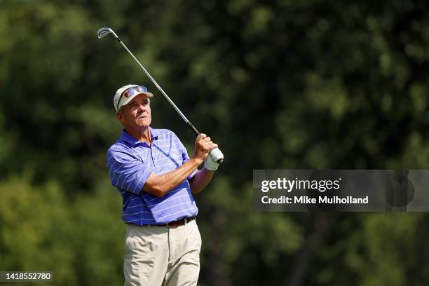 Scott Dunlap of the United States watches his approach shot on the 18th hole during the second round of The Ally Challenge at Warwick Hills Golf And...