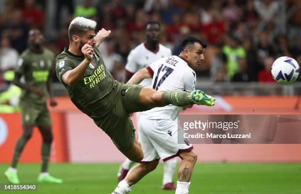 Olivier Giroud of AC Milan scores their team's second goal during the Serie A match between AC Milan and Bologna FC at Stadio Giuseppe Meazza on...