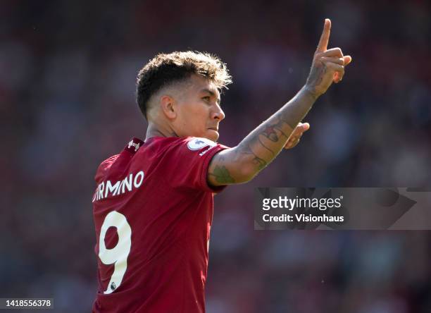 Roberto Firmino of Liverpool celebrates scoring the fourth goal during the Premier League match between Liverpool FC and AFC Bournemouth at Anfield...