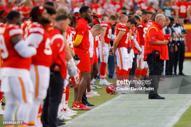 Head coach Andy Reid of the Kansas City Chiefs pauses for a moment of silence honoring Chiefs Hall of Fame quarterback Len Dawson, who died this week...