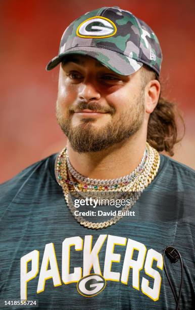 David Bakhtiari of the Green Bay Packers stands near the players bench during the fourth quarter of a preseason game against the Kansas City Chiefs...