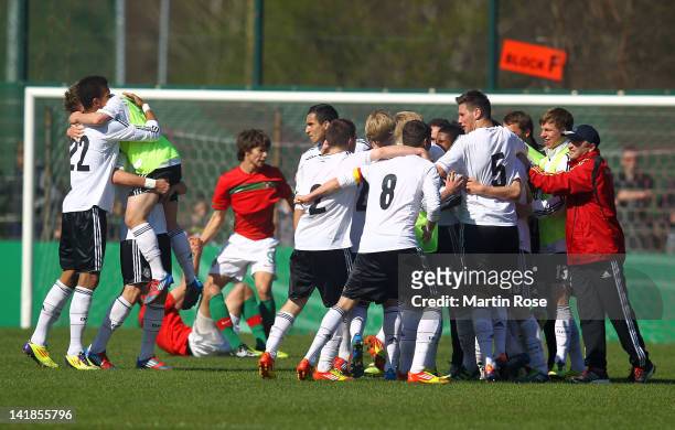 The team of Germany celebrfate after winning the U17 Men's Elite Round match between Germany and Portugal on March 25, 2012 in Bremen, Germany.