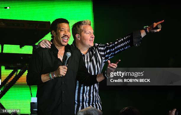 Lionel Richie and Gary LeVox perform on stage at Muhammad Ali's Celebrity Fight Night XVIII on March 24, 2012 in Phoenix, Arizona. The event supports...