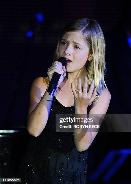 Singer Jackie Evancho performs on stage at Muhammad Ali's Celebrity Fight Night XVIII on March 24, 2012 in Phoenix, Arizona. The event supports the...