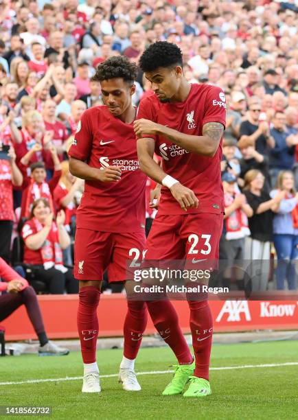 Luis Diaz celebrates his goal to make it 9-0 with Fabio Carvalho of Liverpool by doing a little dance during the Premier League match between...