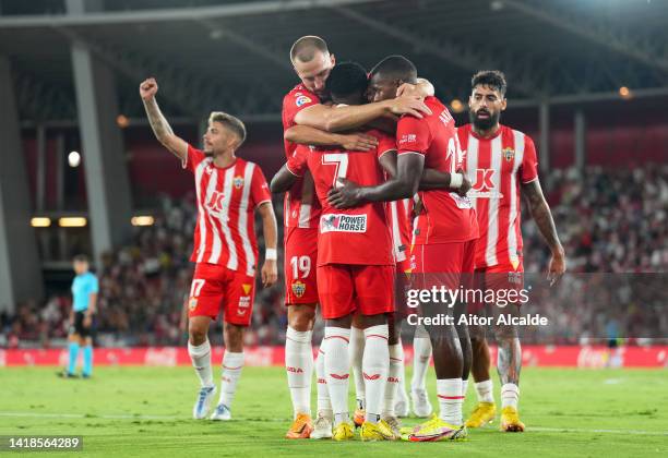 Largie Ramazani of UD Almeria celebrates with teammates after scoring their team's first goal during the LaLiga Santander match between UD Almeria...
