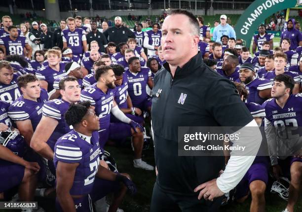 Northwestern Wildcats head coach, Pat Fitzgerald is speaks to his team after the the Aer Lingus College Football Classic 2022 match between...