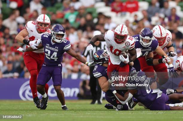 Anthony Grant of Nebraska Cornhuskers makes a break during the Aer Lingus College Football Classic 2022 match between Northwestern Wildcats and...