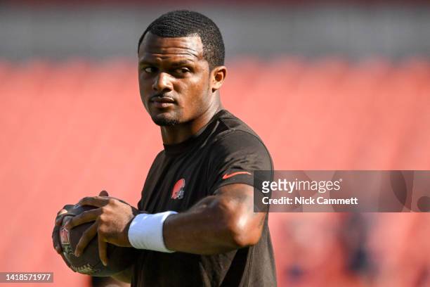 Deshaun Watson of the Cleveland Browns warms up prior to a preseason game against the Chicago Bears at FirstEnergy Stadium on August 27, 2022 in...