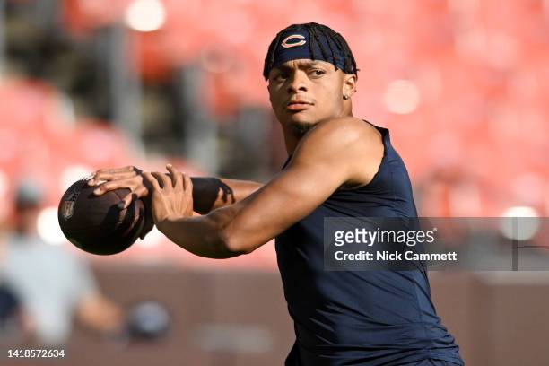 Justin Fields of the Chicago Bears warms up prior to a preseason game against the Cleveland Browns at FirstEnergy Stadium on August 27, 2022 in...