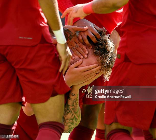 Harvey Elliott of Liverpool brought to tears celebrating after scoring the second goal during the Premier League match between Liverpool FC and AFC...