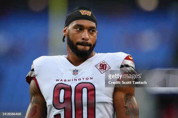 Montez Sweat of the Washington Commanders warms up before the preseason game against the Baltimore Ravens at M&T Bank Stadium on August 27, 2022 in...